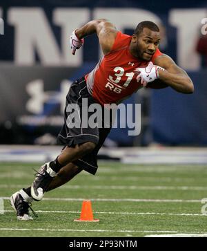 Nov 16, 2009 - Columbus, Ohio, USA - Former Ohio State running back RAYMONT  HARRIS wears the Buckeye's new Nike Pro Uniform was on display at Ohio  Stadium during a press conference