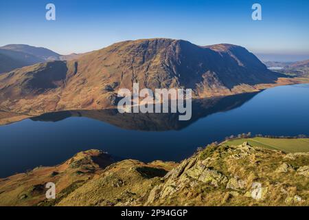 Melbreak reflected in Crummock Water from Rannerdale Knotts with Loweswater in the distance, Lake District, Cumbria, England Stock Photo