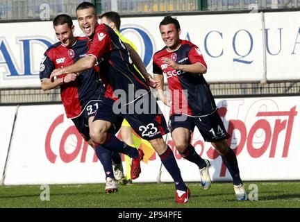 Cagliari s Michele Fini n. 23 foreground celebrates with teammates