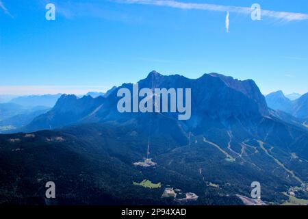 View from the summit of Daniel (2340m), highest peak of the Ammergau Alps, to the Wetterstein massif with from left Waxenstein, in the middle Zugspitze (2963m), on the right Schneefernerkopf, Lermoos, Zugspitzarena, Tirol, Austria Stock Photo