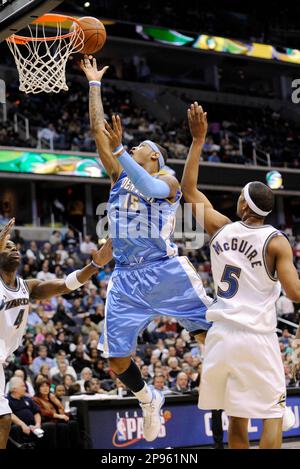 Washington Wizards' Dominic McGuire goes in for a dunk during the fourth  quarter of an NBA basketball game against the New Jersey Nets on Tuesday,  Dec. 2, 2008 in East Rutherford, N.J.