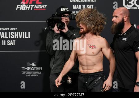 March 10, 2023, Las Vegas, NV, LAS VEGAS, NV, United States: LAS VEGAS, NV - MARCH 10: Merab Dvalishvili face-off and get into a pushing match following the official weigh-ins at UFC Apex for UFC Fight Night - Vegas 71 - Yan vs Dvalishvili on March 10, 2023 in Las Vegas, NV, United States. (Credit Image: © Louis Grasse/PX Imagens via ZUMA Press Wire) EDITORIAL USAGE ONLY! Not for Commercial USAGE! Stock Photo