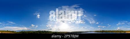 Clouds in the blue sky and the forest by the river. Full panorama 360 degrees in an equiangular equidistant spherical projection. Contents of VR Stock Photo