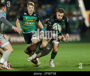 Rory Hutchinson of Northampton Saints is tackled by Tom de Glanville of Bath Rugby during the Gallagher Premiership match Northampton Saints vs Bath Rugby at Franklin's Gardens, Northampton, United Kingdom, 10th March 2023  (Photo by Nick Browning/News Images) Stock Photo