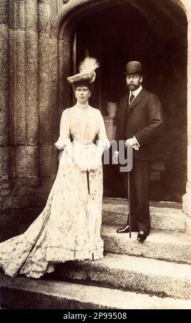 1908 ca , London , England : The future King GEORGE V of the United Kingdom ( Prince of Wales , 1865 - 1936 ) with wife MARY of Teck ( 1867 - 1953 ) . Photo by Dinham , Torquay . Was the first British monarch belonging to the House of Windsor, which he created from the British branch of the German House of Saxe-Coburg-Gotha. As well as being King of the United Kingdom, and the Commonwealth Realms, George was also the Emperor of India and the first King of the Irish Free State. George reigned from 6 May 1910 through World War I (1914–1918) until his death in 1936. Son of King EDWARD VII of Engl Stock Photo