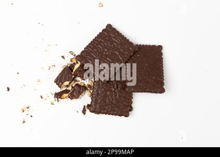 Broken Biscuit Coated in Dark Chocolate Isolated, Crumbled Square Cookies, Rectangular Shortbread Pieces, Crunchy Digestive Cookie Bites, Crumbs on Wh Stock Photo