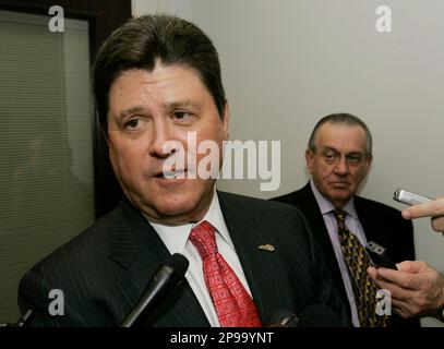 Louisville Democrats House Speaker Pro Tem Larry Clark, left, and Rep.  Charles Miller talk on the House floor during the legislative session in  Frankfort, Ky., Wednesday, March 16, 2011. (AP Photo Stock