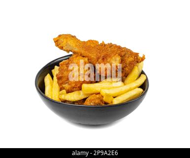 Chicken Legs Portion Isolated, Fry Breaded Drumstick, Deep Fried Chicken Drumsticks with French Fries in Black Bowl on White Background Stock Photo