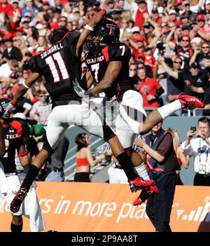 Oklahoma State tight end Brandon Pettigrew, left, wide receiver Dez Bryant  (1) can't come up with a pass in the end zone as Texas Tech safety Darcel  McBath (7) defends during the