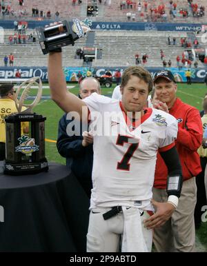 Georgia quarterback Matthew Stafford (7) holds up the MVP trophy in front  of head coach Mark Richt, back right, after defeating Michigan State 24-12  in the Capital One Bowl NCAA college football game in Orlando, Fla.,  Thursday, Jan. 1, 2009. (AP Photo