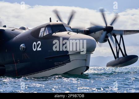 A US-2 amphibious aircraft assigned to Air Rescue Squadron 71, Fleet Air Wing (FAW) 31 floats on water during joint force training in support of Exercise Cope Angel 23-2 near Marine Corps Air Station Iwakuni, Japan, March 2, 2023. Exercise Cope Angel 23-2 is part of a long-standing bilateral training series focused particularly on expanding combined search and rescue capabilities between U.S. Air Force Special Operations Command, and Japan Maritime Self-Defense Force. (U.S. Marine Corps photo by Cpl. Mitchell Austin) Stock Photo