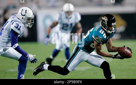 Jaguars' Dennis Northcutt catches a pass against the Colts in Jacksonville