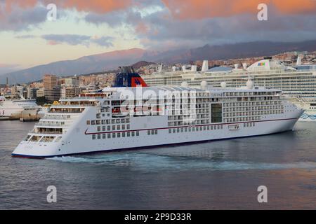 The cruise ship “MS Europa 2” deploys its bow and stern thrusters to turn the vessel on its own axis prior to docking at Santa Cruz, Tenerife. Stock Photo