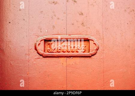 Vintage unique Letters sign translated as for mails signage on the steel red door in South of France - postal communication delivery Stock Photo