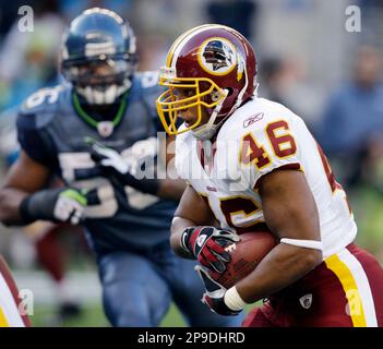 Washington Redskins Ladell Betts (46) eludes the tackle attempt of