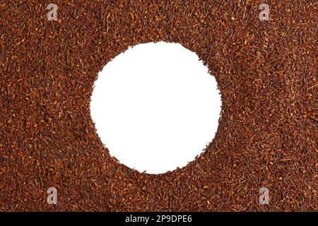 Frame made of dry rooibos tea leaves on white background, flat lay. Space for text Stock Photo