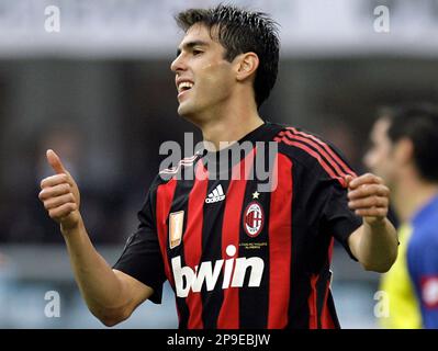 AC Milan Brazilian forward Ricardo Kaka, right, fights for the ball