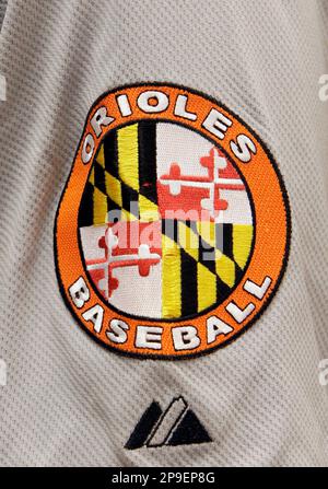 Former Baltimore Orioles player Boog Powell smiles while displaying the  teams away batting practice jersey during a press conference, Wednesday,  Nov. 12, 2008, in Baltimore. For the first time since 1972, the