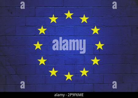 Flag of the European Union painted on a cinder block wall. Stock Photo