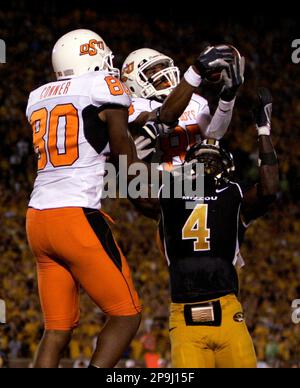 Oklahoma State tight end Brandon Pettigrew, left, wide receiver Dez Bryant  (1) can't come up with a pass in the end zone as Texas Tech safety Darcel  McBath (7) defends during the