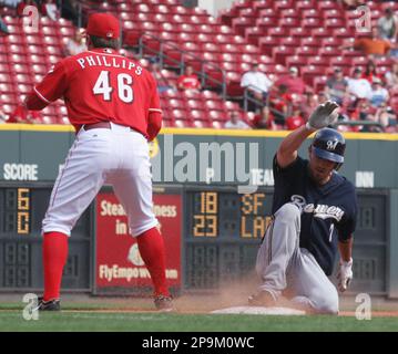 Milwaukee Brewers' J.J. Hardy slides home during the fourth inning of a  baseball game Thursday, May 14, 2009, in Milwaukee. (AP Photo/Morry Gash  Stock Photo - Alamy