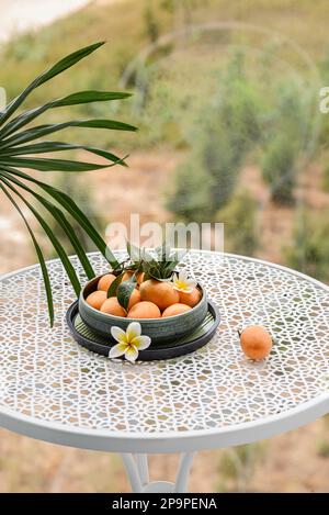 mango plum on the table on the balcony . High quality photo Stock Photo