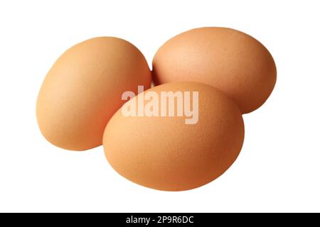 Three of raw chicken eggs Isolated on white backdrop Stock Photo