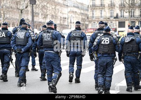 A policeman (CRS) with uniform ensuring security in Paris, France on ...