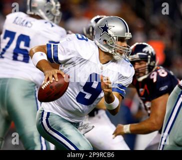 Dallas Cowboys wide receiver Dez Bryant (88) eludes Washington Redskins  defenders to take a Tony Romo pass for 85 yards and a touchdown in the  third quarter at Cowboys Stadium in Arlington