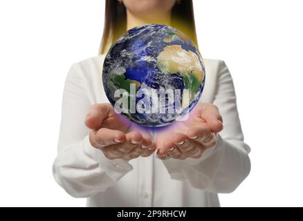 World in our hands. Woman holding digital model of Earth on white background, closeup view Stock Photo