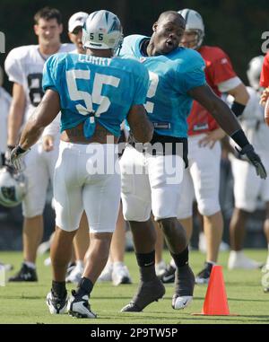 Carolina Panthers linebackers coach Ken Flajole gives instructions to  rookie Jon Beason during Beason's first practice at training camp in  Spartanburg, South Carolina, Monday, August 6, 2007. (Photo by David T.  Foster