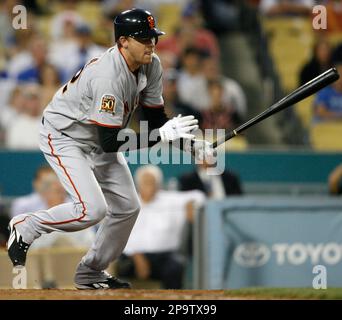 The Giants' Aaron Rowand hits a single in the fifth inning against the Los  Angeles Dodgers on Saturday at Dodger Stadium. (Michael Macor/San Francisco  Chronicle via AP Stock Photo - Alamy