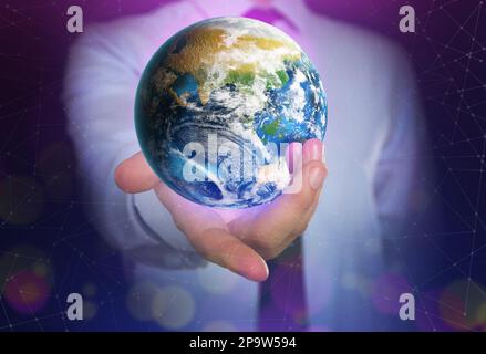 World in our hands. Man holding digital model of Earth, closeup view Stock Photo