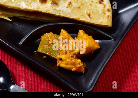 Closeup of mango pickle in plate, aam ka achar Stock Photo