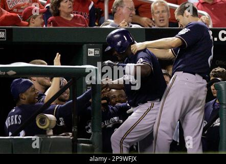 Milwaukee Brewers' J.J. Hardy, right, is congratulated by Prince Fielder  after hitting a two-run home run during the fifth inning of a baseball game  against the Pittsburgh Pirates Friday, July 4, 2008