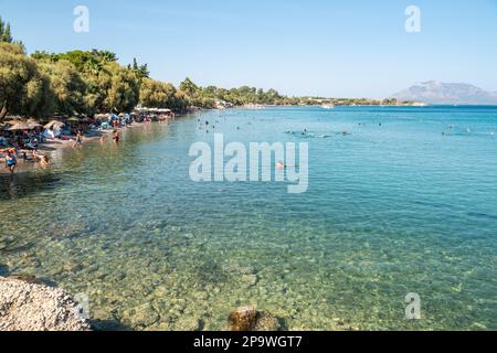 Datca, Mugla, Turkey – August 19, 2022. Hastanealti Plaji beach in Datca, Turkey. View with people in summer. Stock Photo