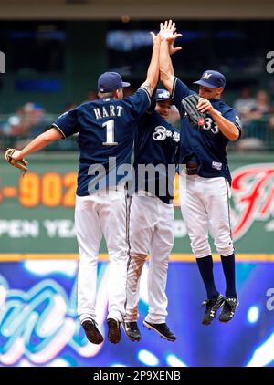 Milwaukee Brewers' Ryan Braun (8), Gabe Kapler (33) and Mike Cameron,  center, celebrate after the ninth inning of a baseball game against the  Pittsburgh Pirates on Sunday, July 6, 2008, in Milwaukee.