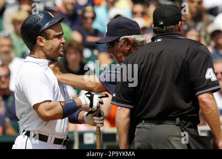 Detroit Tigers' Placido Polanco, right, is congratulated by Miguel Cabrera  after scoring in the third inning of a baseball game against the Kansas  City Royals, Saturday, Aug. 30, 2008, in Detroit. (AP