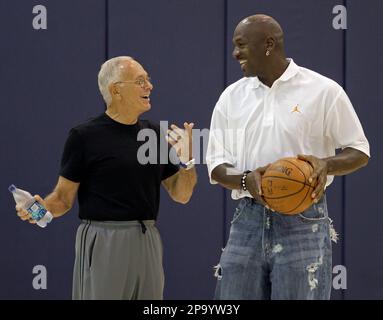 Charlotte Bobcats coach Larry Brown left talks with part owner Michael Jordan right after pre draft workouts for the team in Charlotte N.C. Wednesday June 25 2008. AP Photo Chuck Burton Stock Photo Al...