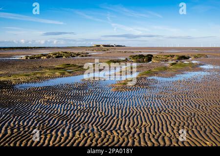 Tidal pools in sand between Little Eve island and Little Hilbre Island in Dee Estuary at low tide. West Kirby Wirral Peninsula Merseyside England UK Stock Photo