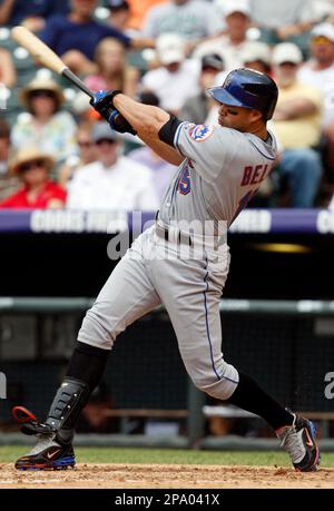 New York Mets' Endy Chavez, left, Shawn Green, and Carlos Beltran  celebrates their 9-5 victory over the Los Angeles Dodgers in game 3 of the  NLDS baseball series in Los Angeles on