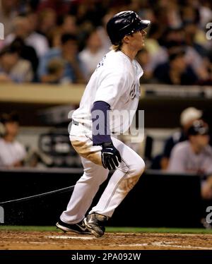 San Diego Padres' Khalil Greene watches his ground ball single to left  field to drive in the tying run in the eighth inning against the Arizona  Diamondbacks in their baseball game in