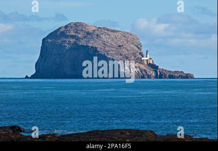 North Berwick, East Lothian, Scotland, UK. 11th march 2023. Sunshine blessed the seaside for those out and about on the beach and the water with a coll temperature of 4 degrees centigrade. Pictured: The iconic Bass Rock awaits the return of the Gannets. Stock Photo