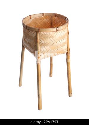 Empty wicker plant stand isolated on white. Interior accessory Stock Photo