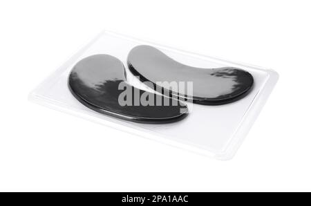 Package with under eye patches isolated on white. Cosmetic product Stock Photo