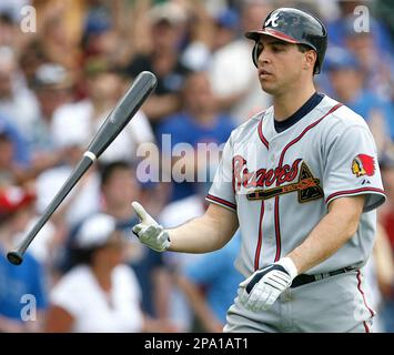 Mark Teixeira of the Atlanta Braves is congratulated by Jeff