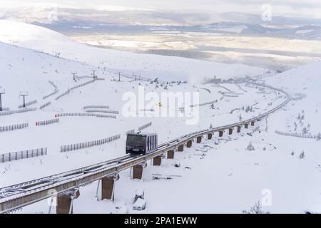 Cairngorm Mountain Railway funicular carries skiers up to ski slopes at Cairngorm Ski Area near Aviemore , Scotland, UK Stock Photo