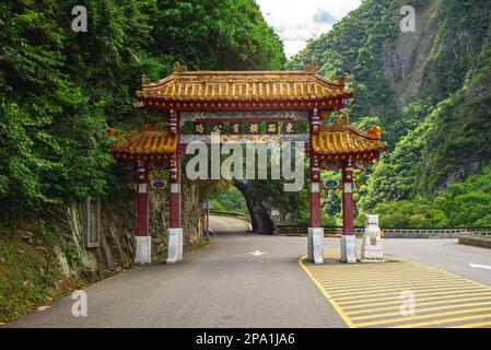 Taroko National Park East Entrance Arch Gate in Hualien, taiwan. Translation: East to west Cross Island Highway Stock Photo
