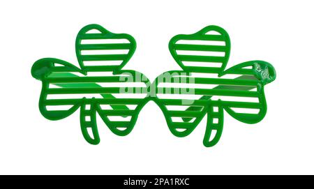 Shamrock shaped glasses, green eyewear isolated on white for Saint Patricks day. Stock Photo
