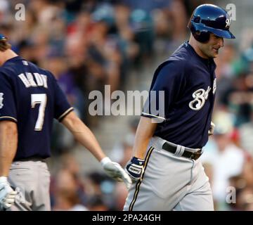 Milwaukee Brewers' J.J. Hardy (7) congratulates Jason Kendall (18) during  the eighth inning of a baseball game against the Minnesota Twins on  Wednesday, June 24, 2009, in Milwaukee. Hardy scored on a